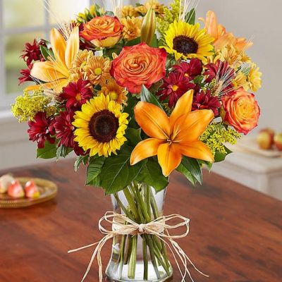 This wonderful autumn bouquet is gathered with fresh-picked flowers, revealing the rustic beauty of nature.

Shades of golden yellow, rich red and pops of orange create a timeless gift for someone special to enjoy.