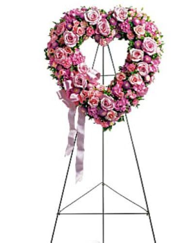 <div id="mark-1" class="m-pdp-tabs-marketing-description">In the shape of a heart, and accented with a pink satin ribbon, this garden of delicate blooms is a tender and classic tribute to a precious life, and a cherished expression of love and sympathy.</div>
<div id="desc-1">
<ul>
 	<li>Beautiful flowers such as light pink roses, hydrangea and miniature carnations mix with lavender chrysanthemums on an open heart-shaped wreath.</li>
</ul>
</div>