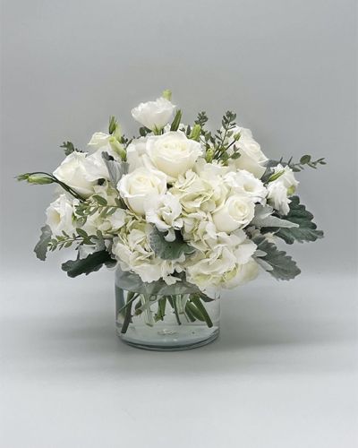 If you're looking for the perfect gift in a dazzling array of white flowers, then look no further as this arrangement is guaranteed to turn heads and make your recipient smile.