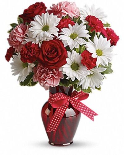 <div class="m-pdp-tabs-description">
<div id="mark-1" class="m-pdp-tabs-marketing-description">Delight your love with this beautiful bouquet of bright white chrysanthemums, precious pink carnations, romantic red roses and more in a radiant red vase.</div>
</div>
<p id="arrngDescp">The charming bouquet includes white daisy spray chrysanthemums, pink carnations, red miniature carnations and red roses accented with fresh greenery in a stylish red vase.</p>
