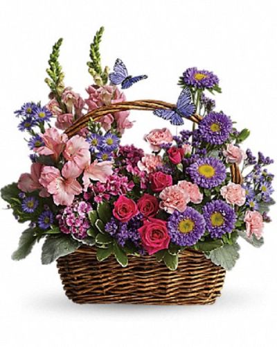 <div class="m-pdp-tabs-description">
<div id="mark-1" class="m-pdp-tabs-marketing-description">Talk about a bountiful basket! This wicker basket is overflowing with beauty and blossoms. It's no wonder two pretty butterflies have made this basket their home.</div>
</div>
<p id="arrngDescp">Hot pink spray roses, light pink alstroemeria, snapdragons and miniature carnations, dark pink Sweet William, purple matsumoto asters, large monte cassino asters, statice and pittosporum fill a pretty picnic-like basket. You've got this gift handled!</p>