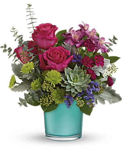 <div id="mark-3" class="m-pdp-tabs-marketing-description">
<div id="mark-3" class="m-pdp-tabs-marketing-description">
<div id="mark-3" class="m-pdp-tabs-marketing-description">
<div id="mark-3" class="m-pdp-tabs-marketing-description">A wonderland of color! This vibrant mix of dark pink roses with pops of green and purple looks especially wondrous in this shimmering blue topaz-colored vase! A glorious gift for any occasion.</div>
&nbsp;
<div id="desc-3">

This wondrous arrangement features dark pink roses, dark pink alstroemeria, miniature purple carnations, green button spray chrysanthemums, blue sinuata statice, dusty miller, spiral eucalyptus, seeded eucalyptus, lemon leaf, and a large green echeveria succulent plant.

</div>
</div>
</div>
</div>